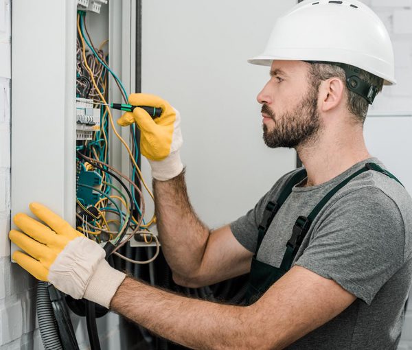 side-view-of-handsome-bearded-electrician-repairin-resize.jpg side-view-of-handsome-bearded-electrician-repairin-resize.jpg